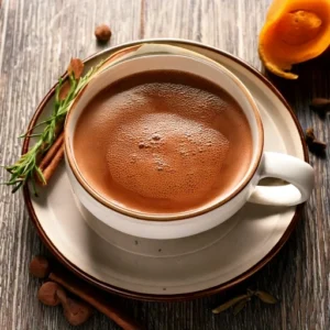 Heat liquids: In a small saucepan over medium heat, combine bone broth and almond milk. Heat until warm but not boiling. Add chocolate: Whisk in cocoa powder, chocolate chips, and a pinch of sea salt. Stir until chocolate is melted and fully incorporated. Sweeten and flavor: Add maple syrup or honey (to taste), vanilla extract, and any optional spices. Blend (optional): For a frothy, creamy texture, blend the mixture for 10–15 seconds using an immersion blender or traditional blender. Serve: Pour into mugs and top with a sprinkle of cocoa powder or cinnamon. Enjoy warm.